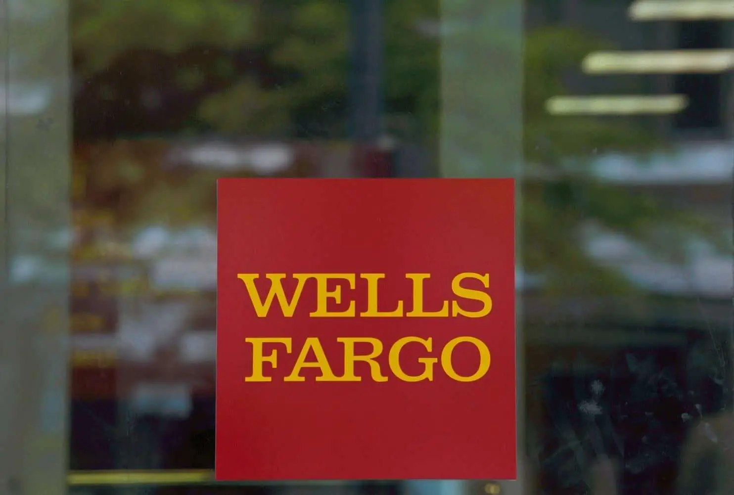 Fannie Mae settles with Wells Fargo as mortgage review ...